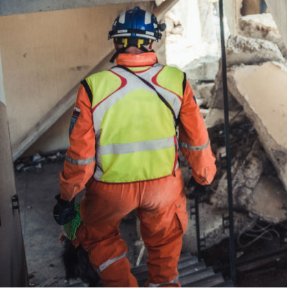 Construction Relief Worker cleaning up building