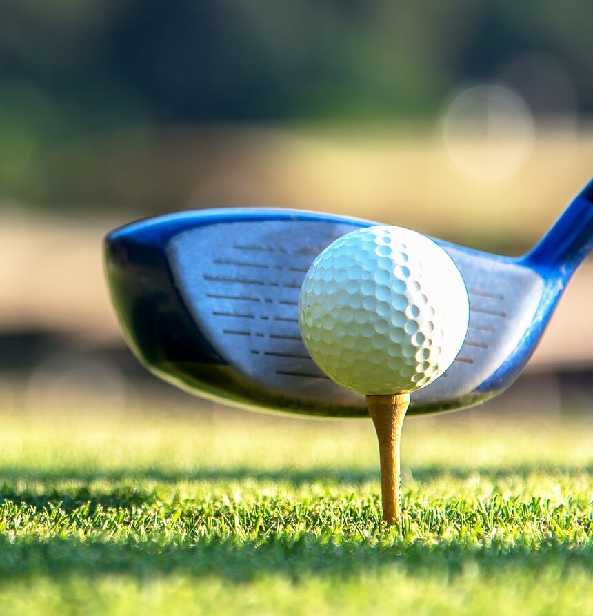 Golf Club Hitting a Golf Ball